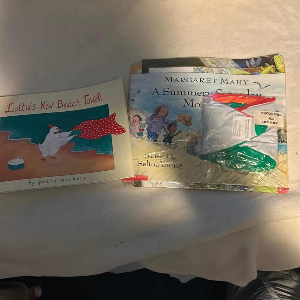 Cute brand new Beach Set of books with a ball in package in pictures